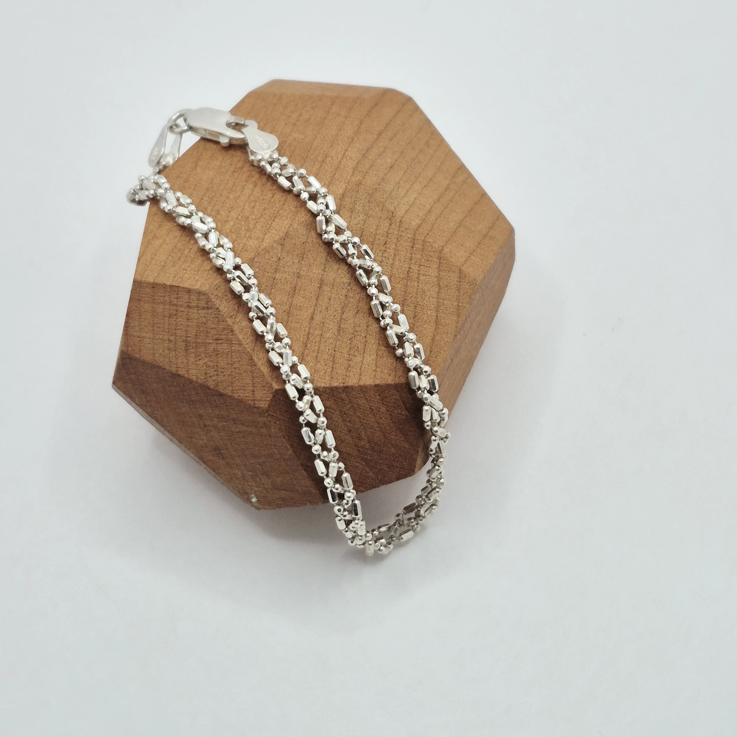 1️⃣ Textured sterling silver bracelet with intricate links, Milano style, 7 inches