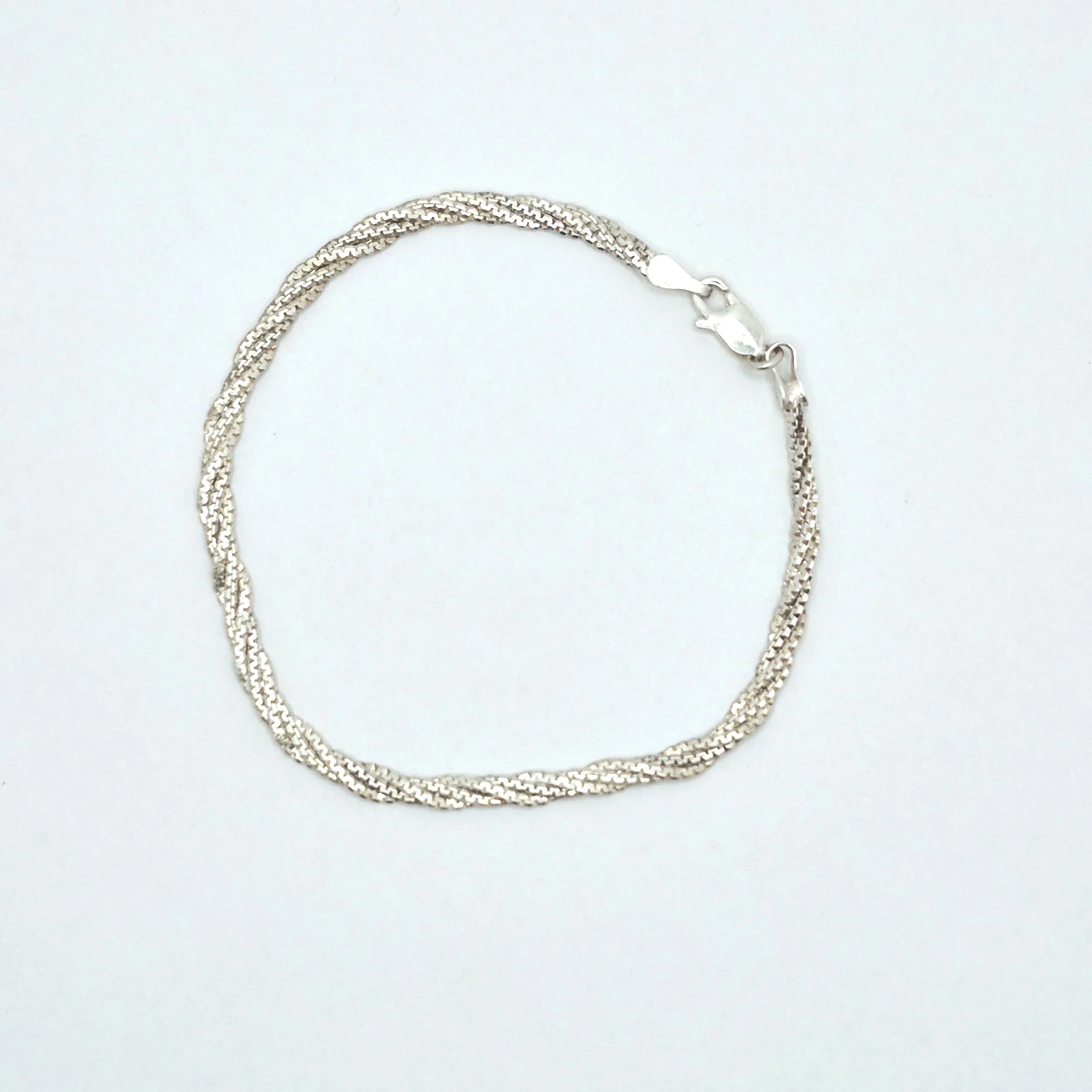 3️⃣ 925 sterling silver twisted chain bracelet with minimalist elegance
