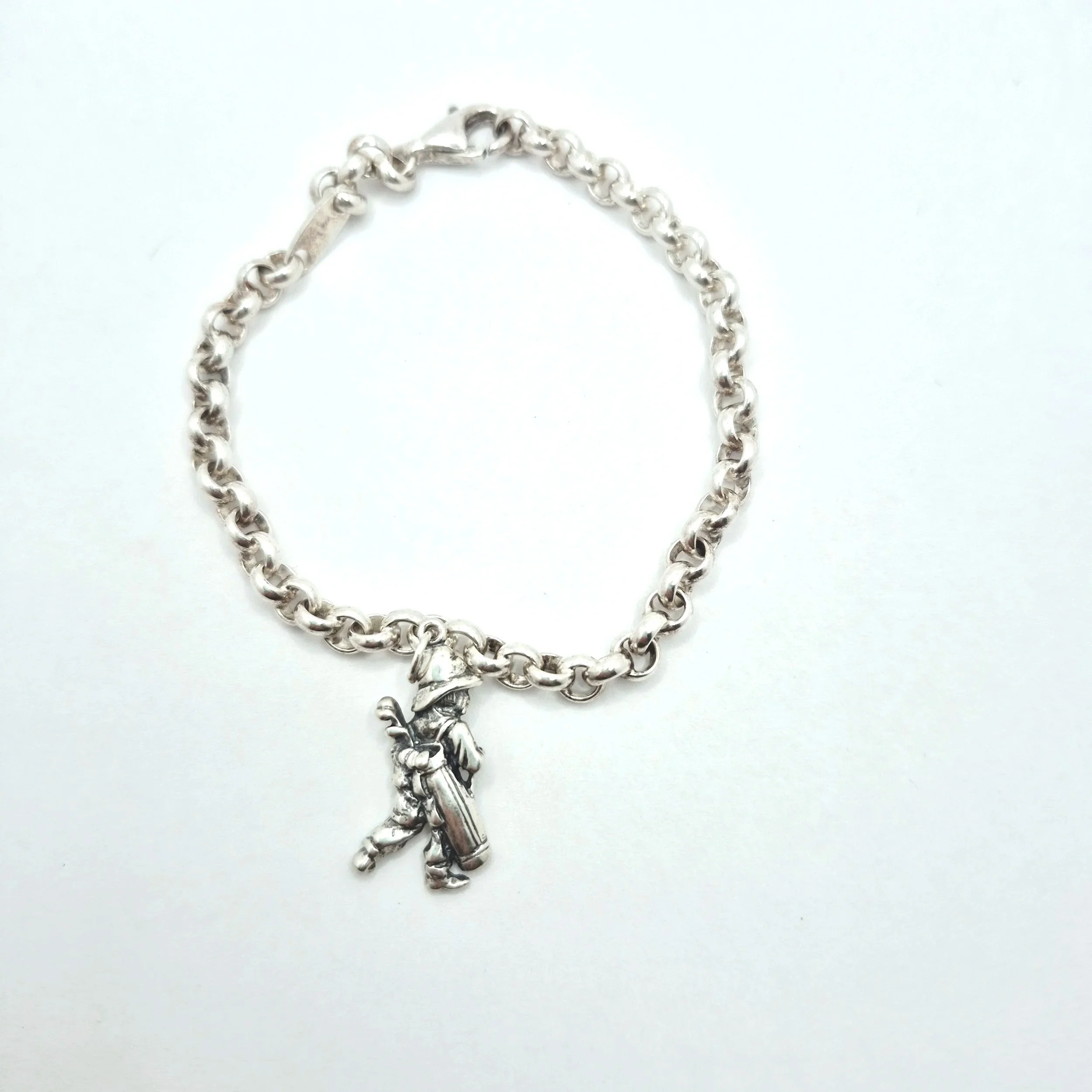 925 silver chunky link bracelet featuring sports-themed golfer pendant