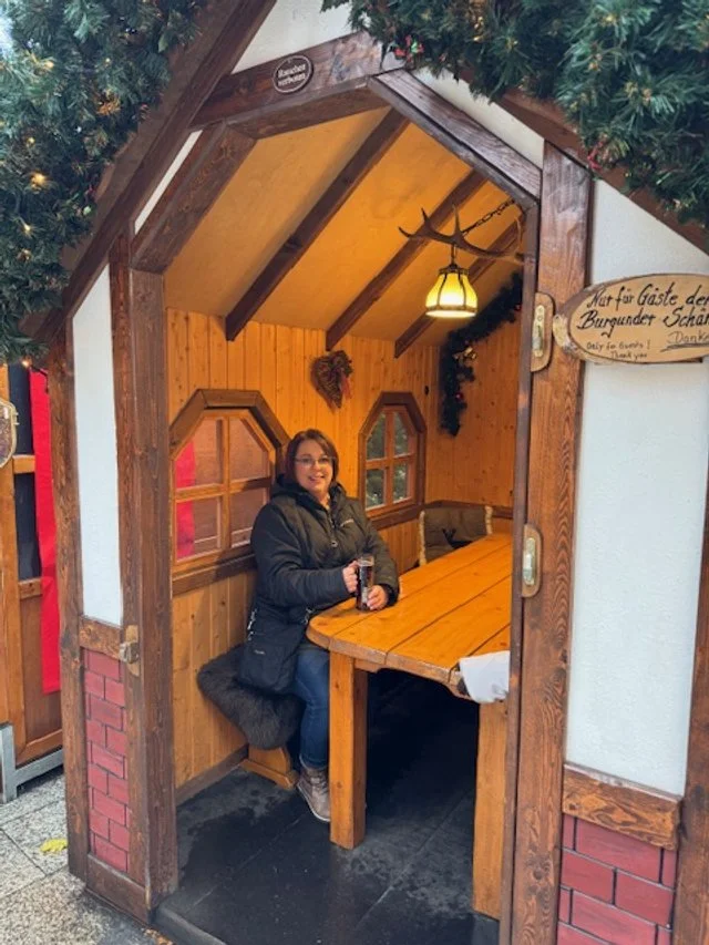 Warming up with mulled wine at the Kurfürstendamm Christmas Market in Berlin