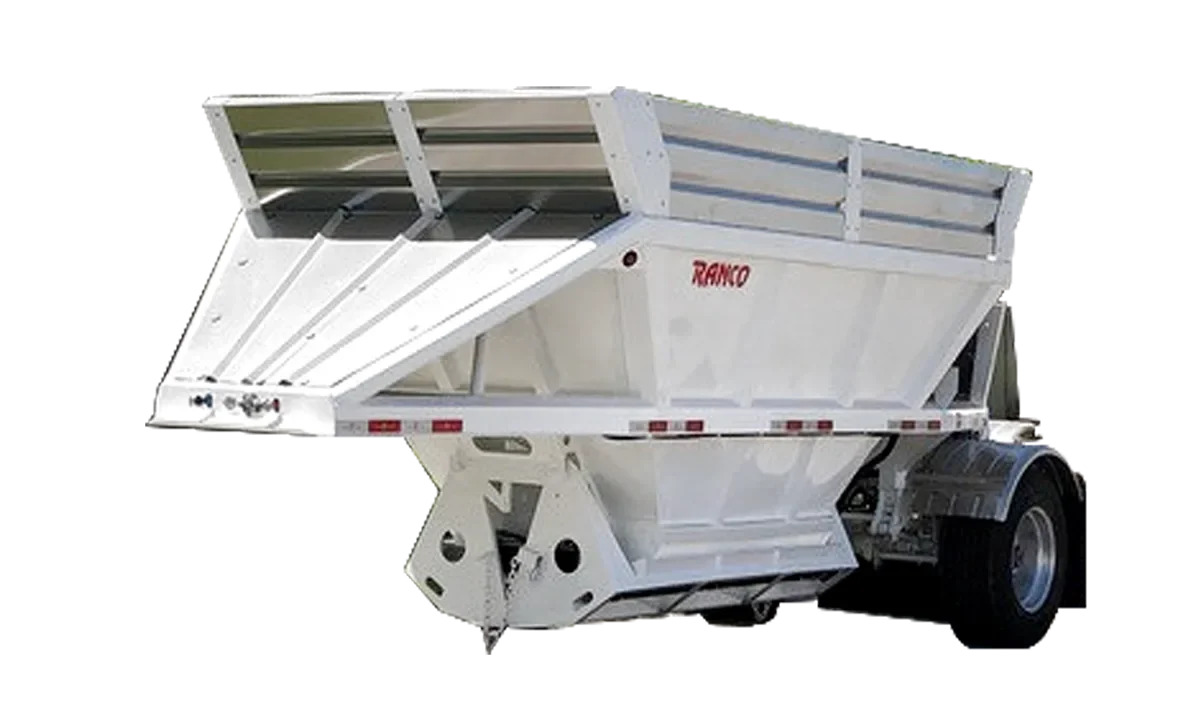 White agricultural dump trailer with raised flooring on a trailer chassis.