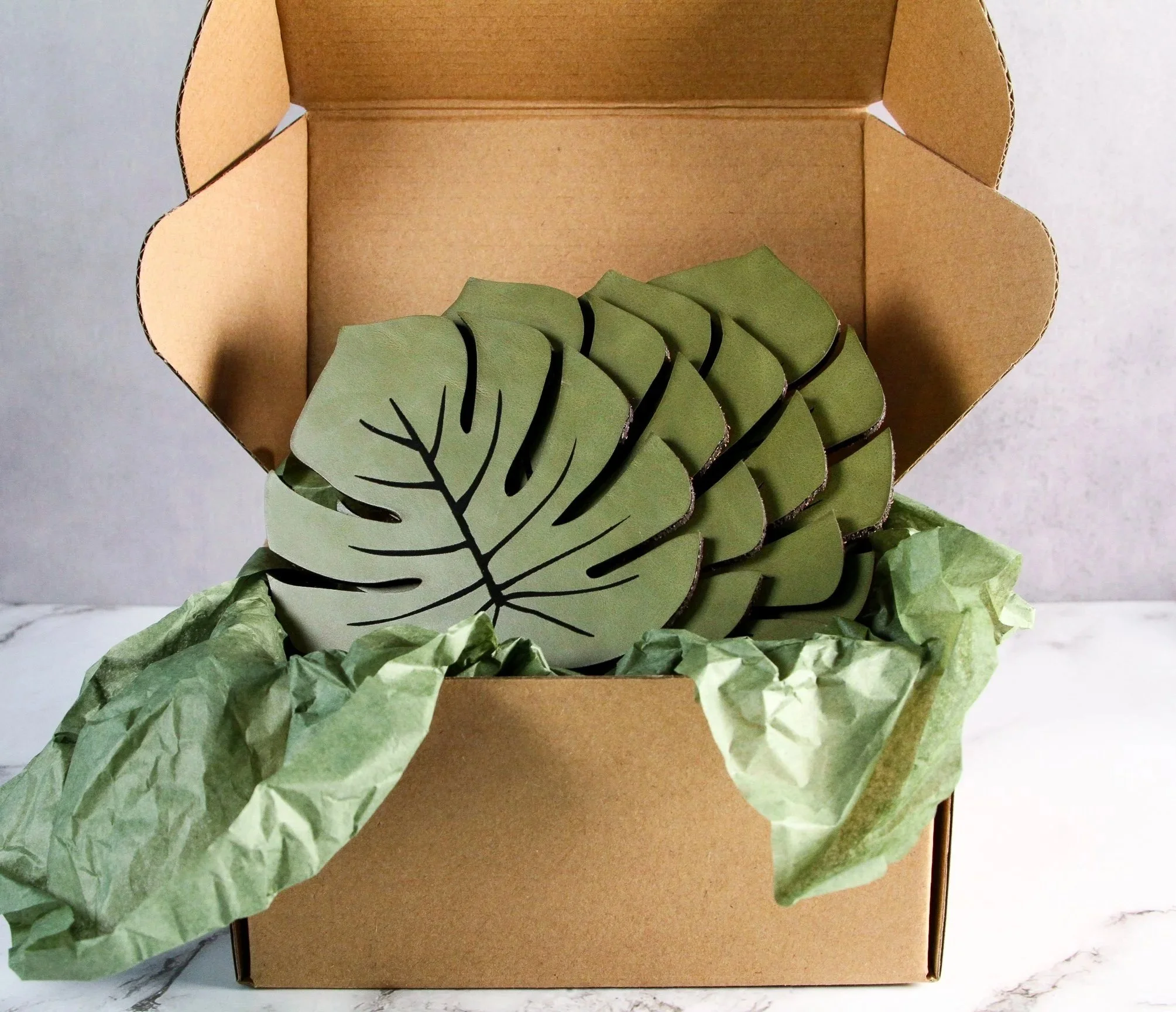 Monstera Leaf Coaster set ready to ship in a Harrelson Handcrafted box. Made in Maple Falls, WA.
