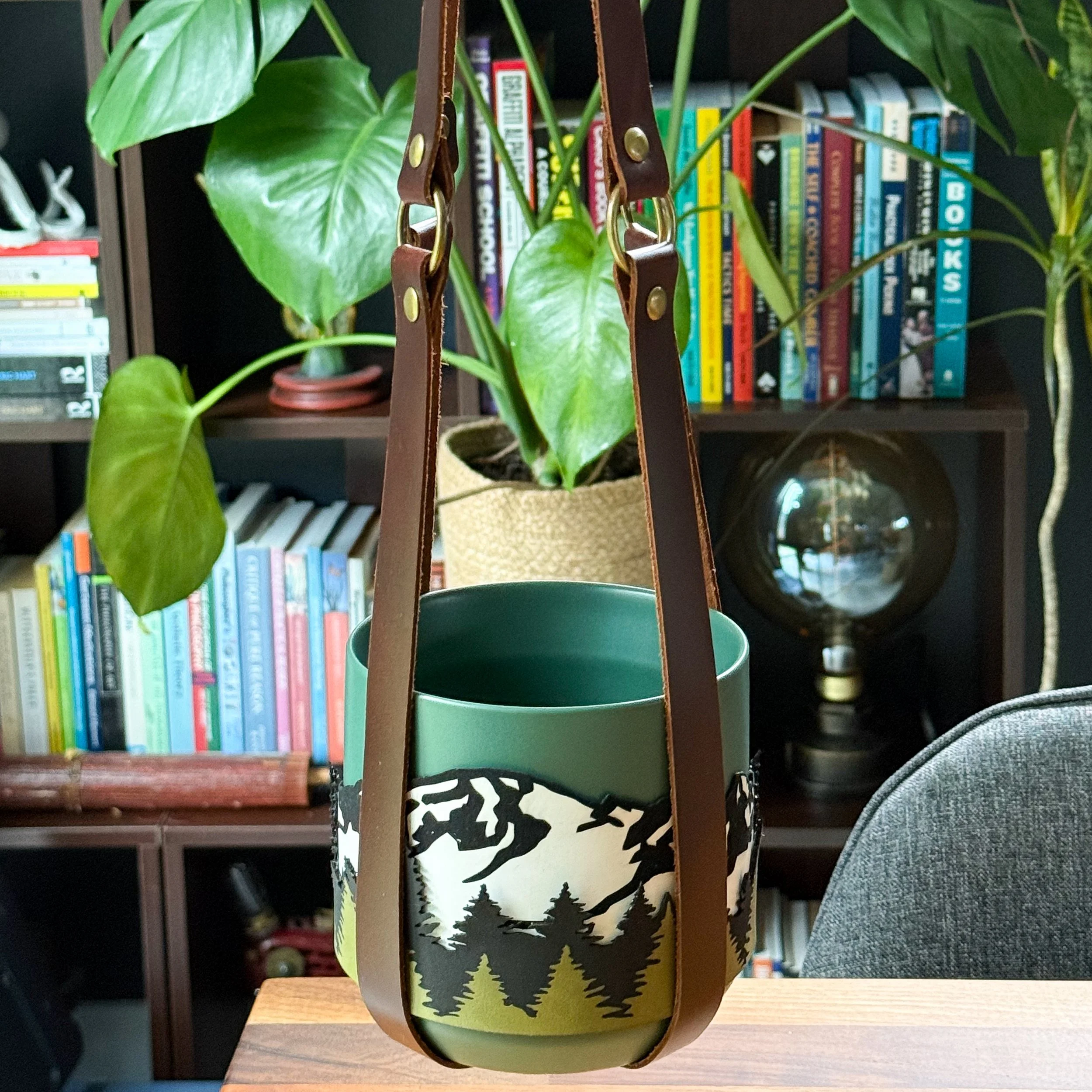 Handmade antique copper chrome-tanned leather plant hanger with brass grommets, fits pots up to 8 inches, made in Maple Falls Washington