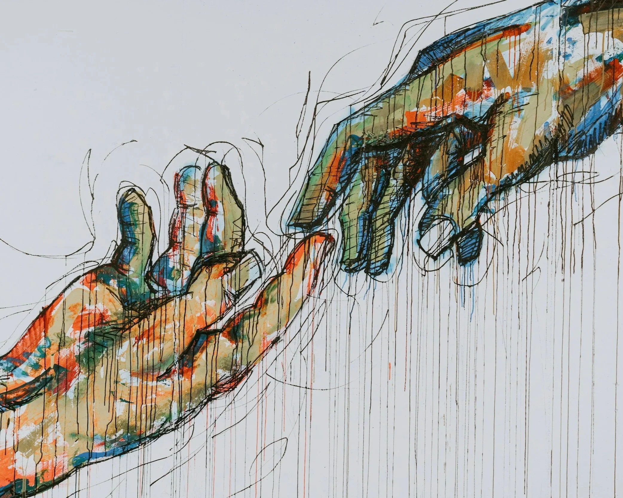 A colorful abstract drawing of two hands reaching to hold each other, using mixed media with splashes of orange, blue, green, and black ink with drips down the paper.