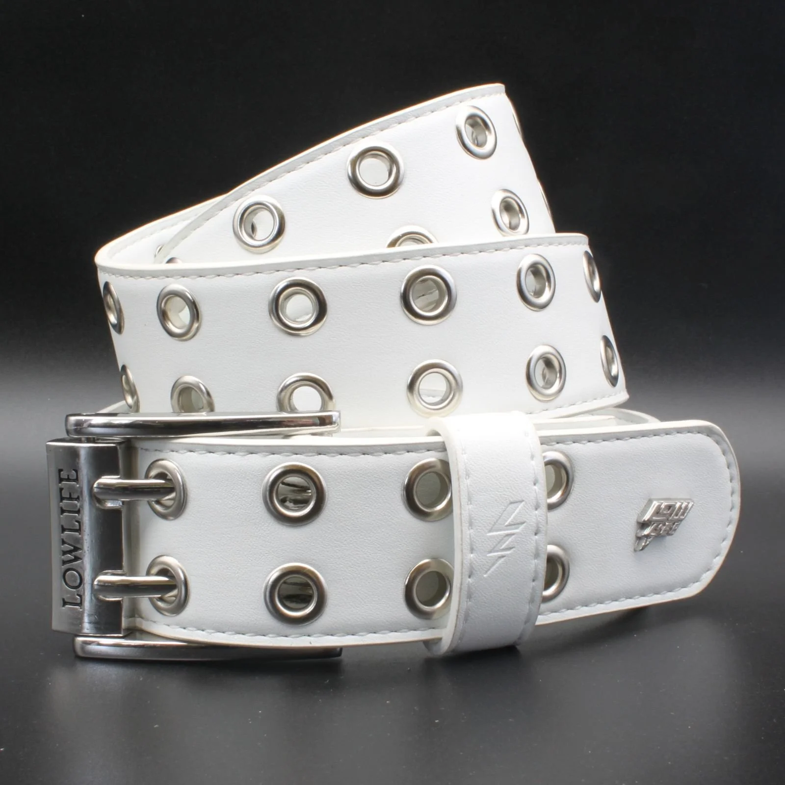 Duplici Vegan Double Eyelet Faux Leather Belt in White & Silver
