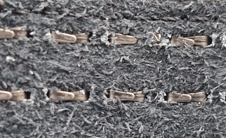 Photo of studs with sharp leg fixings