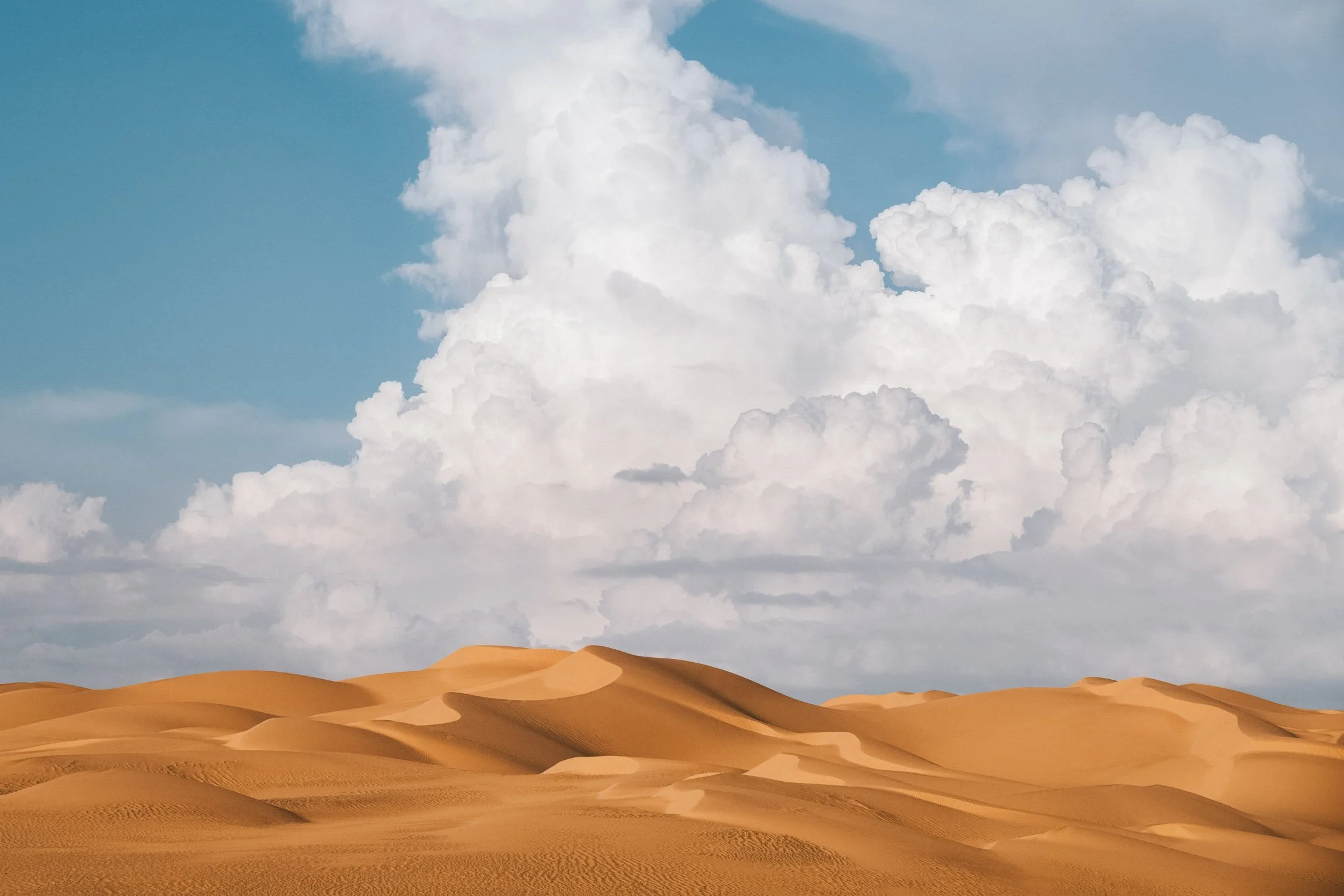 Dramatic Clouds Over Imperial Sand Dunes. California.