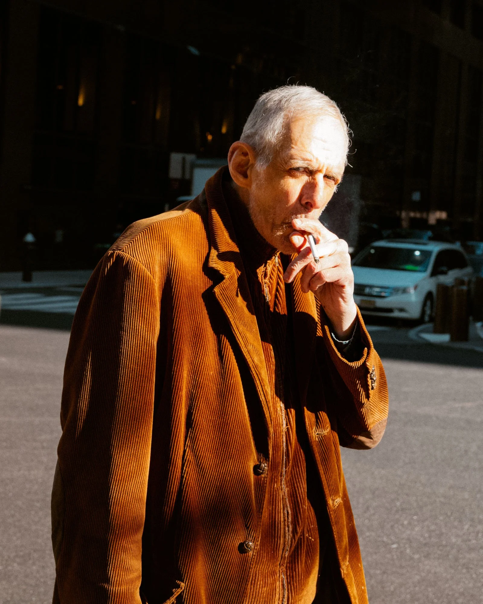 L1004127_Man Smoking Cigarette in Corduroy.jpg