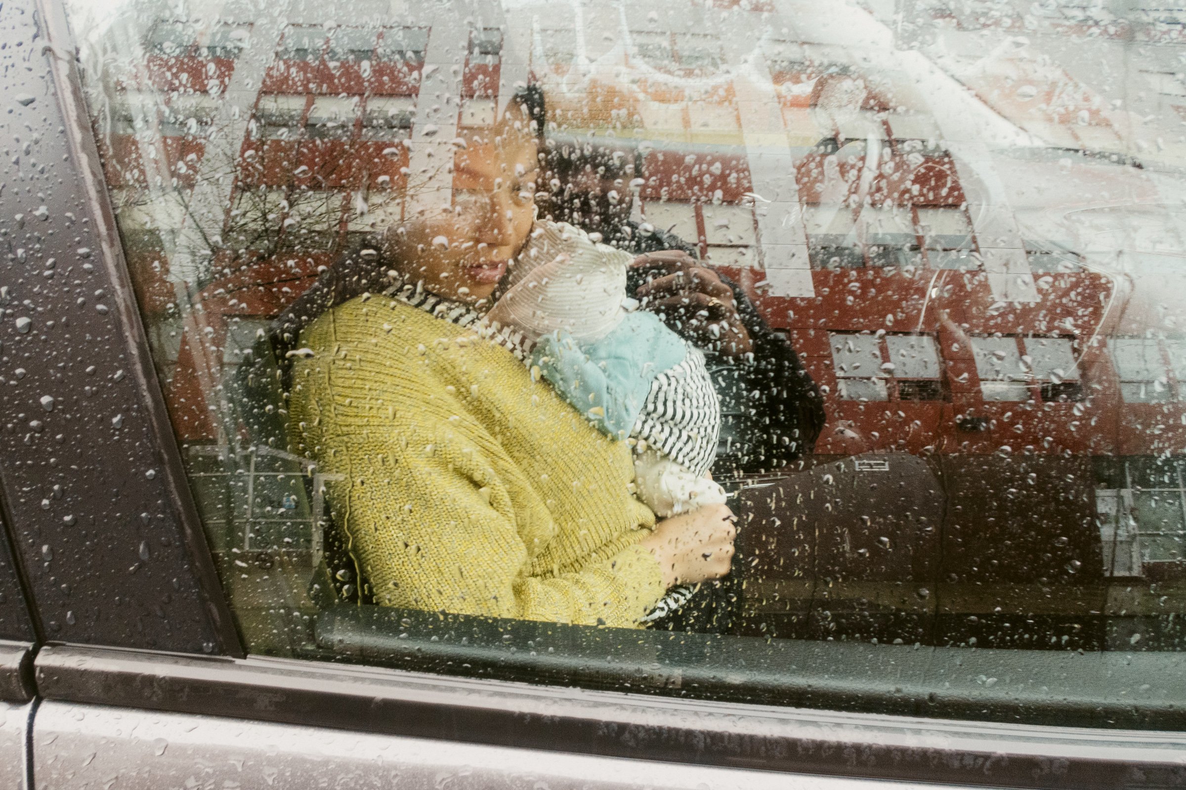 IMG_3943_Alex-Georgie_ThruRainyWindow.jpg