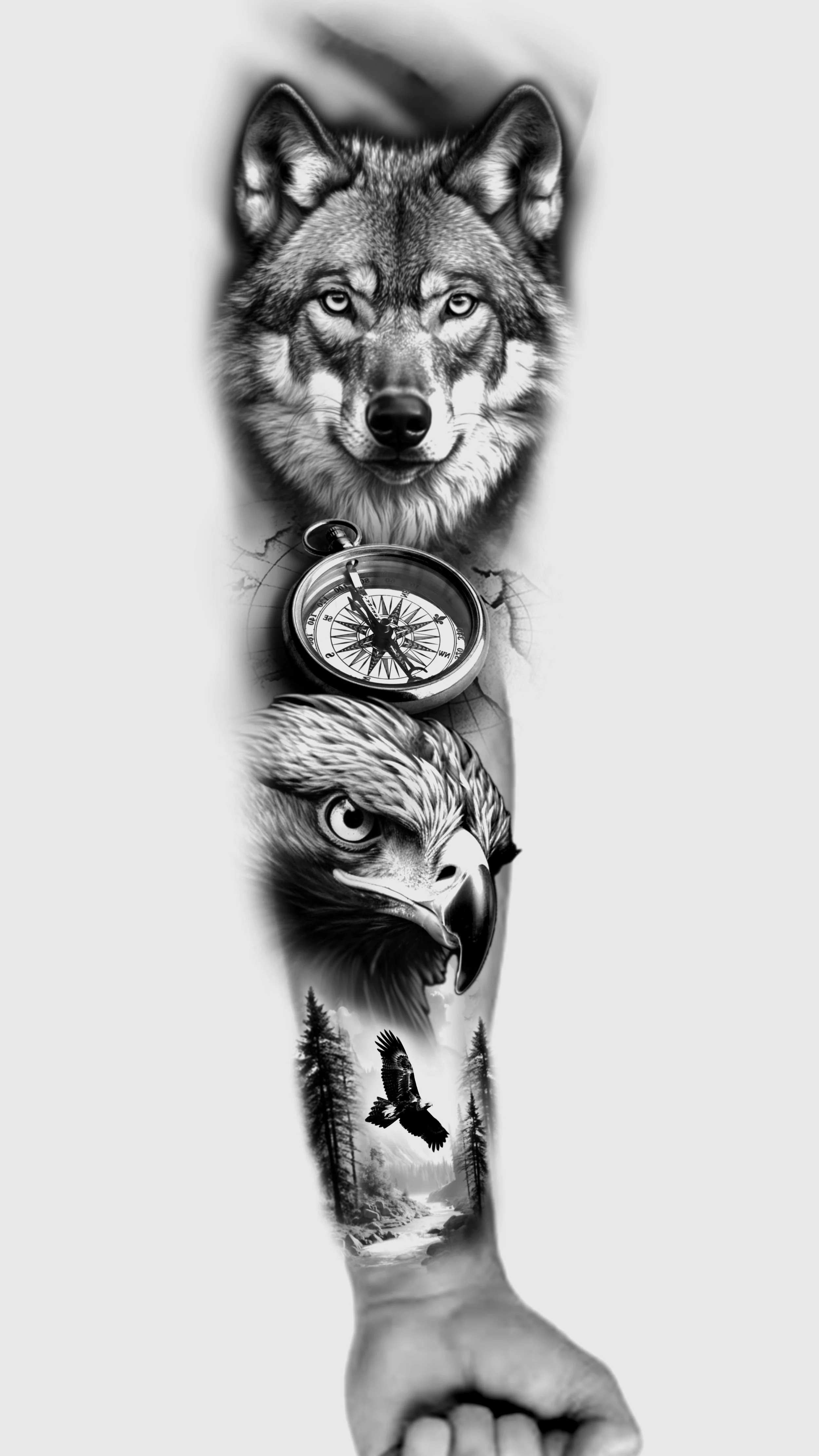 Tattoo of a wolf's face on the upper arm, a mountain stream scene with trees, an eagle in flight, and a compass on the shoulder.