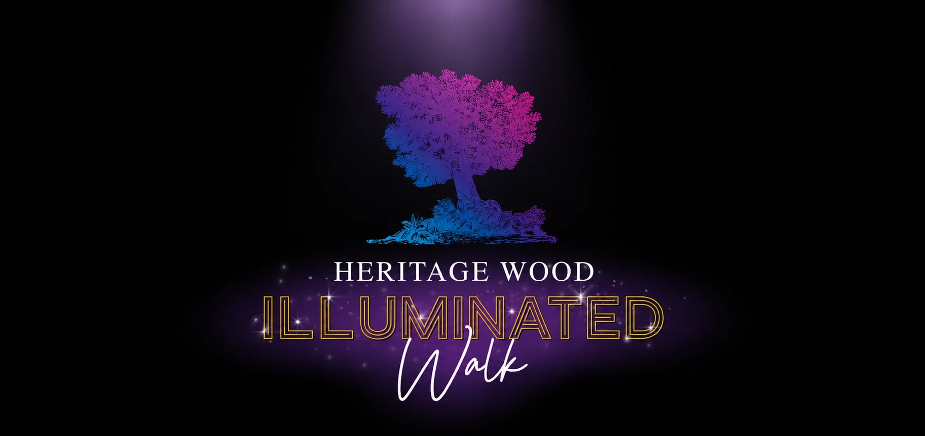 The illuminated walk at heritage wood logo