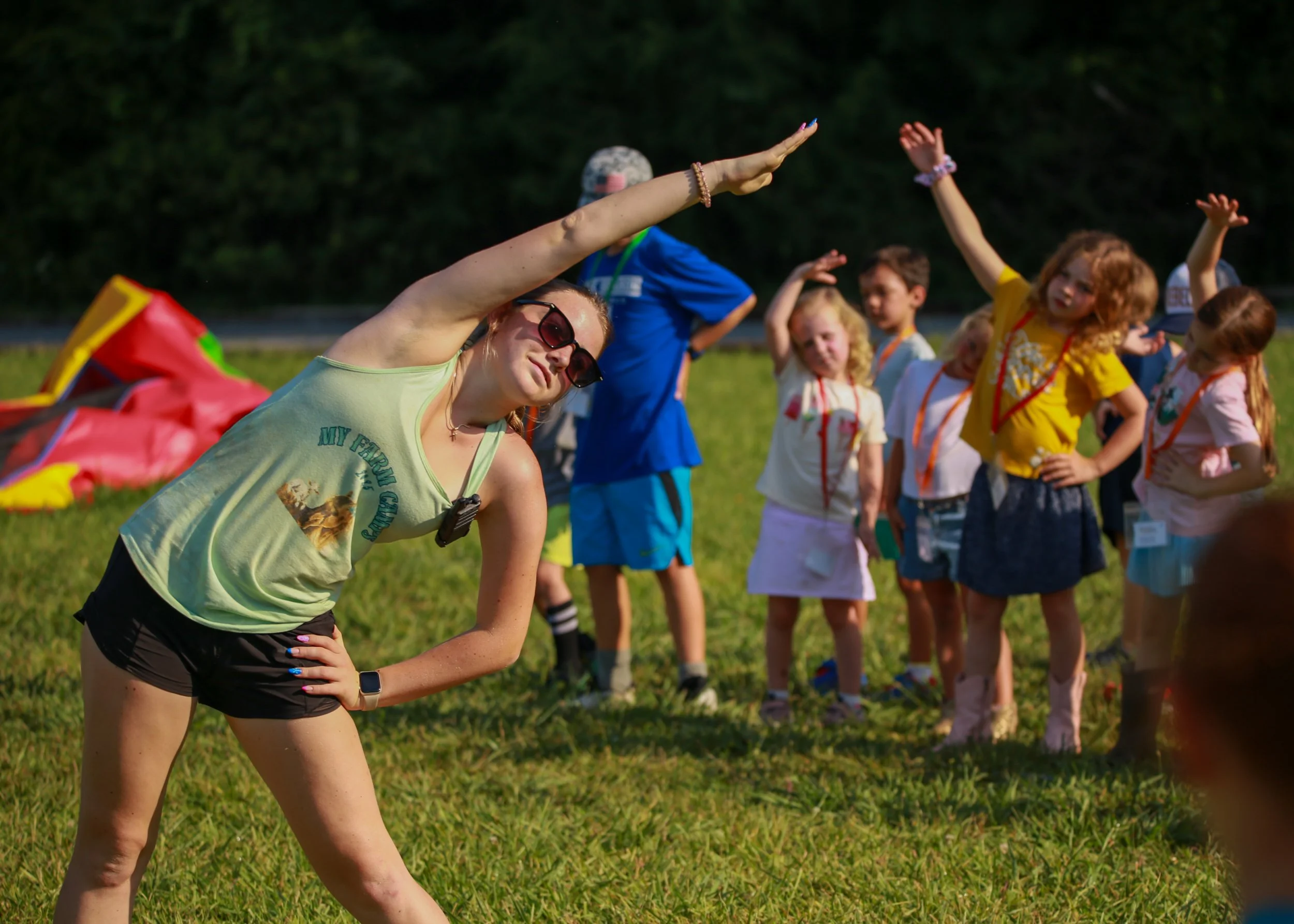 Keira leading stretches camp 2025.jpg