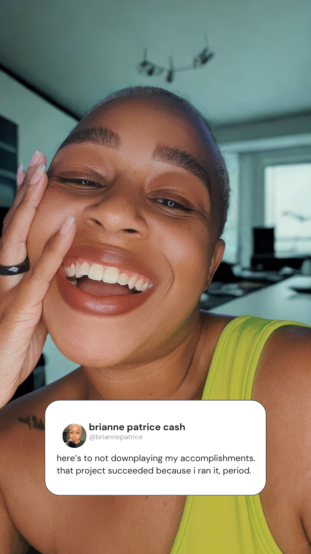 black woman smiling in her home office