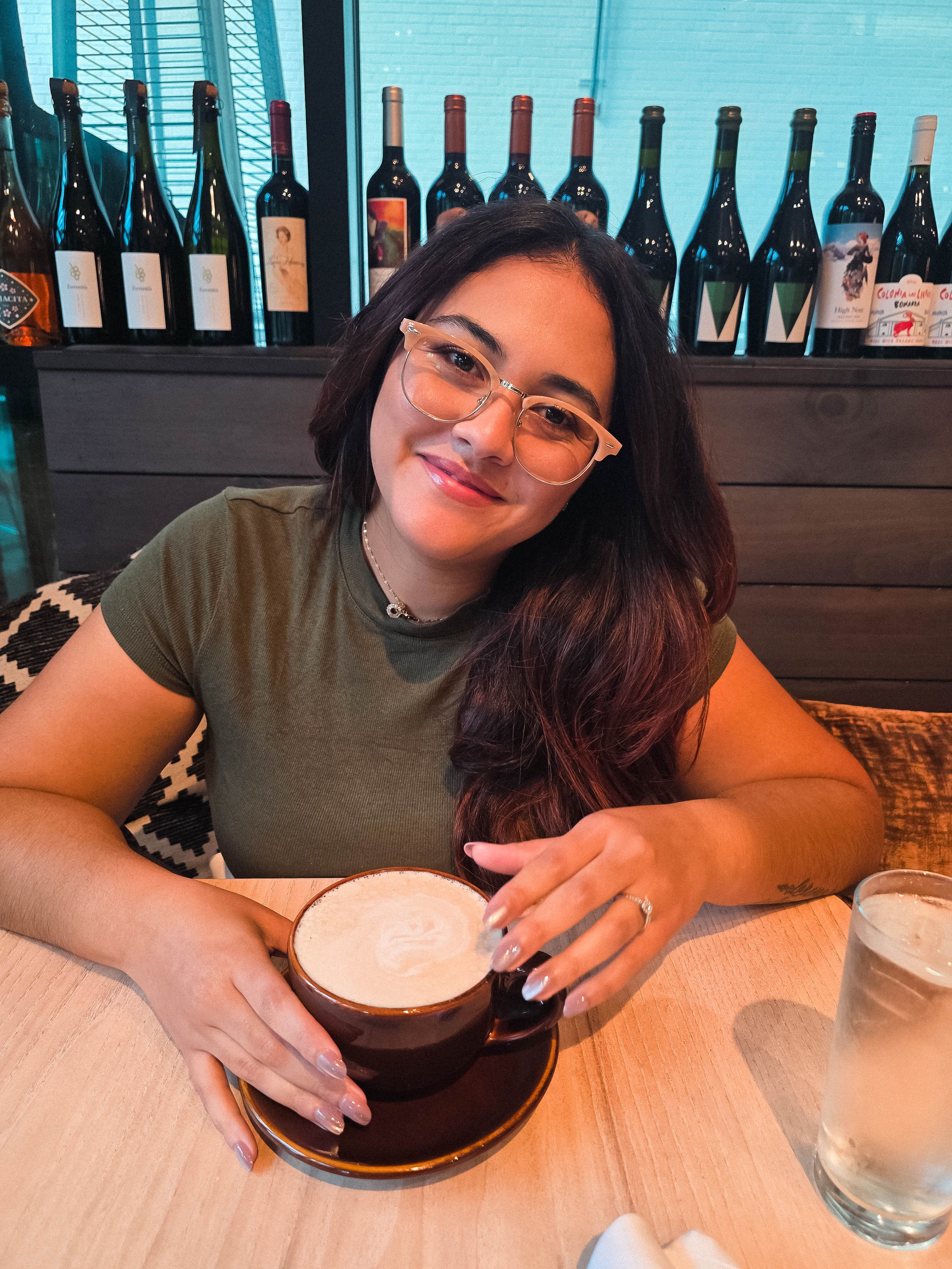 young girl having coffee at a cafe