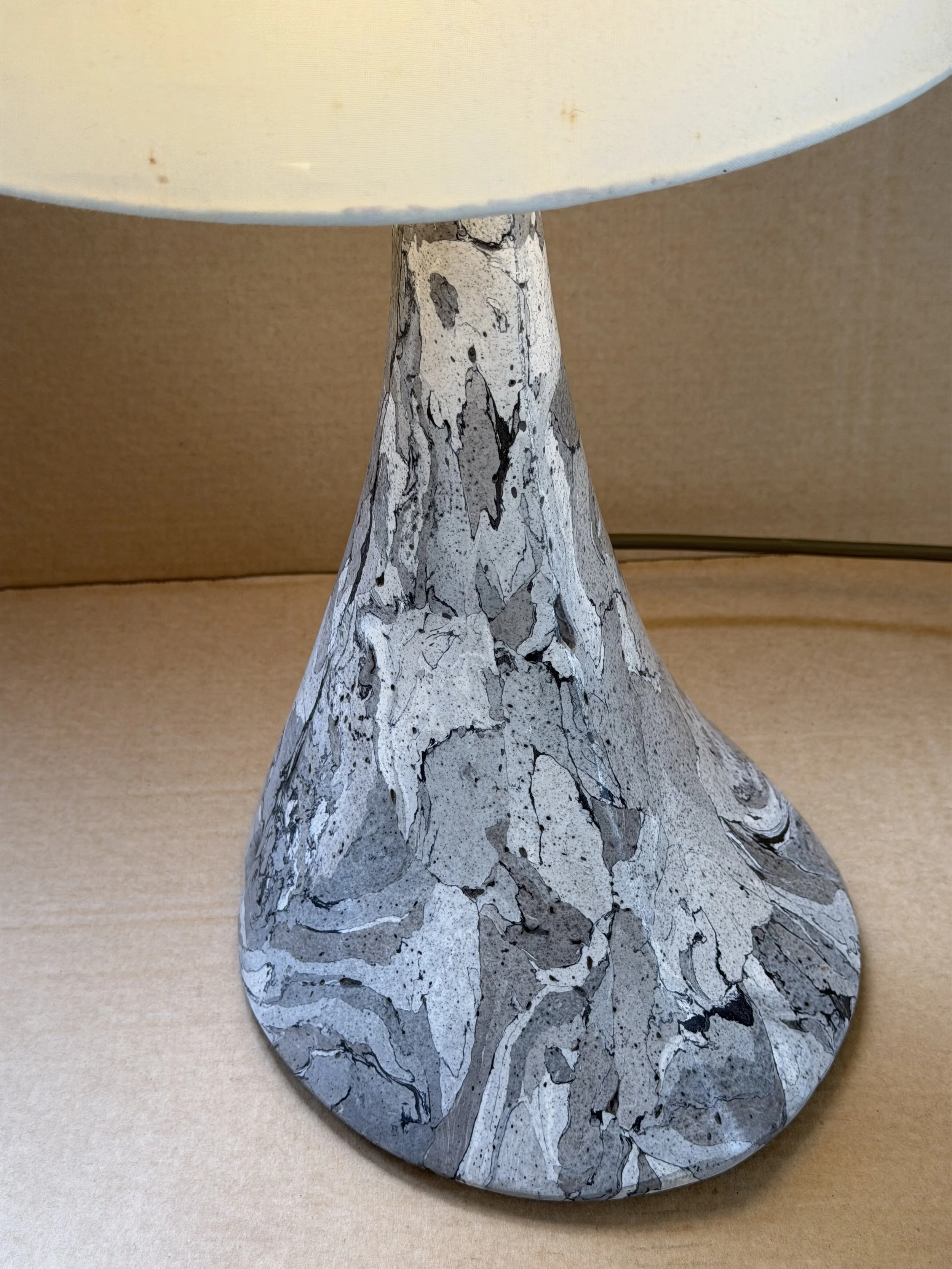 Gray Marble Table Lamp shown with a cream drum shade, the marbled base below