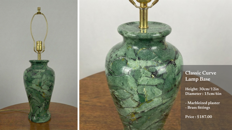 A green marbleized plaster lamp base with brass fittings, measuring 30cm tall and 15cm in diameter, placed on a wooden surface.
