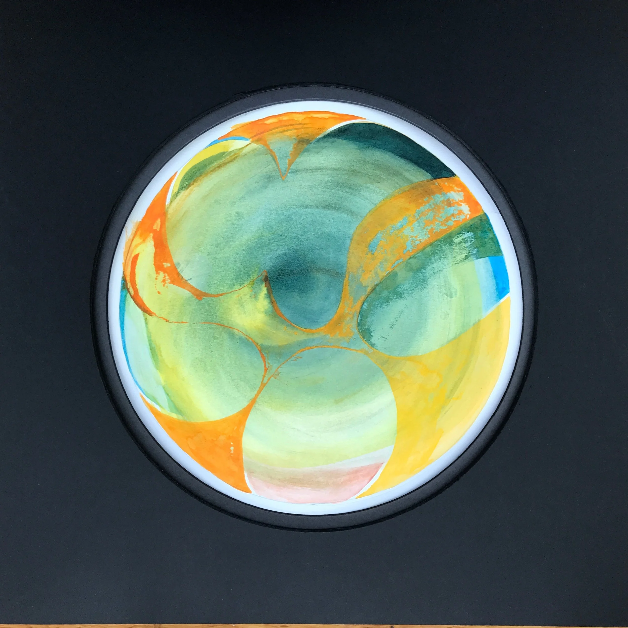 Orange Fruit Painted World, the circular painting shown against a slate grey ground