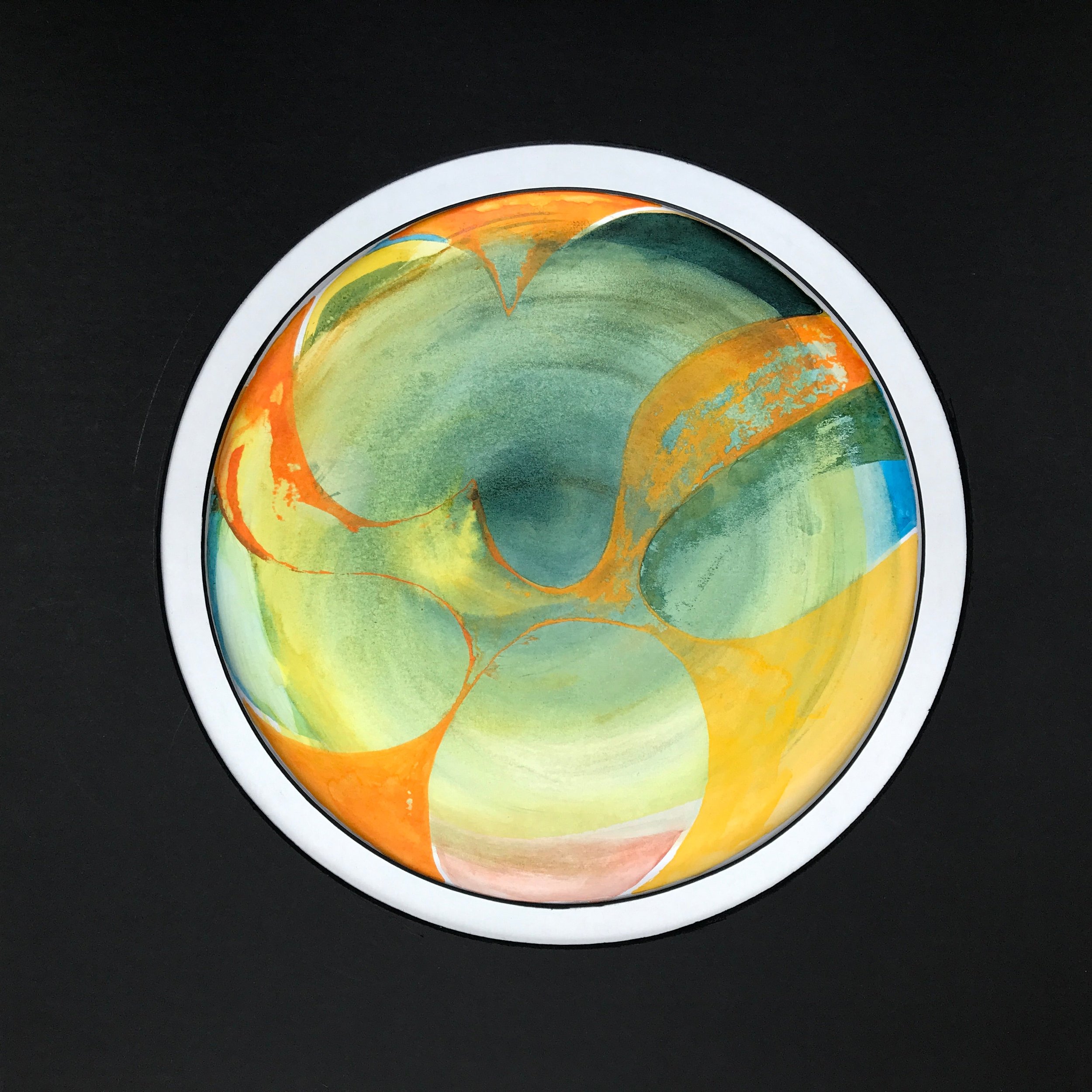 Orange Fruit Painted World, the amber and green forms shown against a black ground