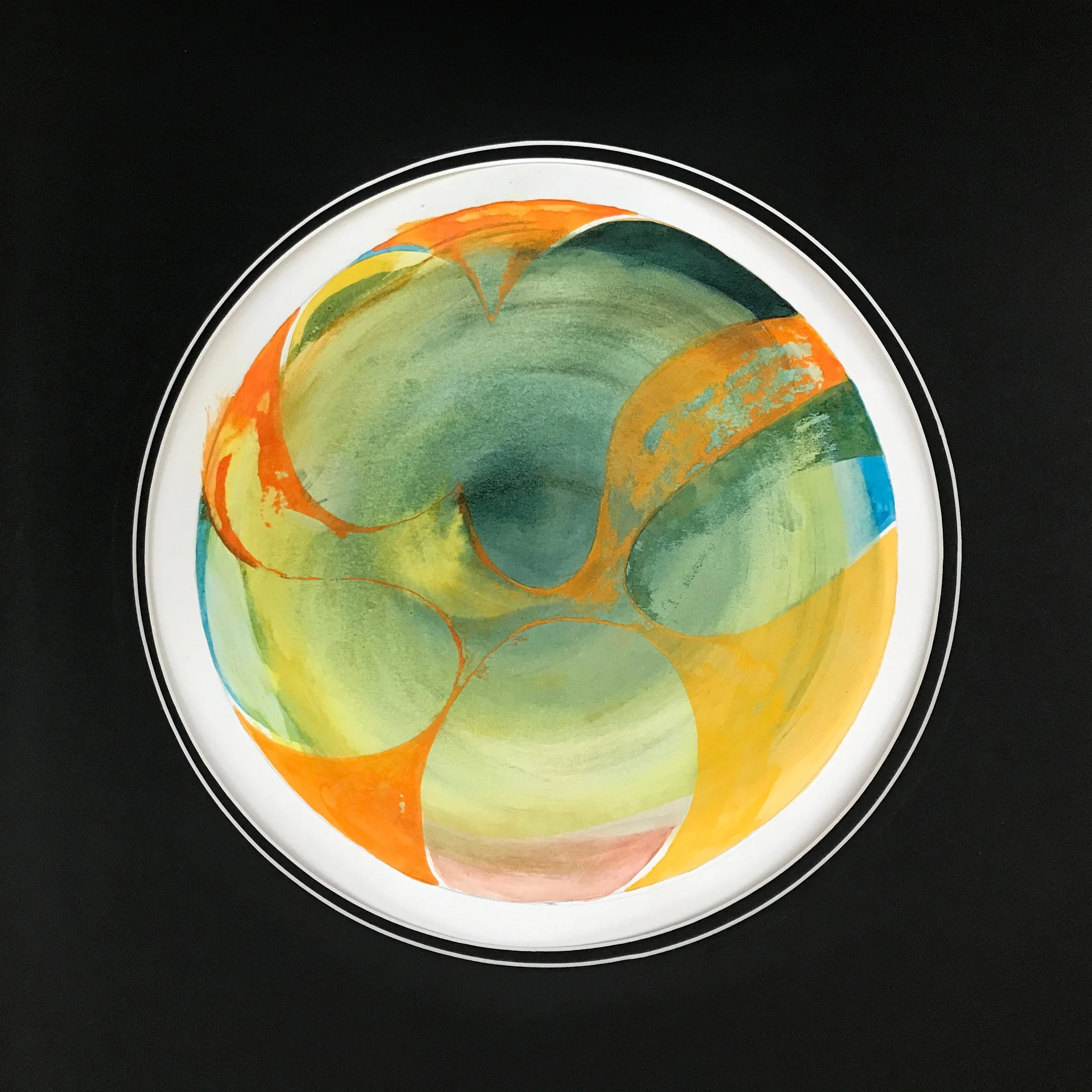 Orange Fruit Painted World, the circular painting with its white rim against a black ground