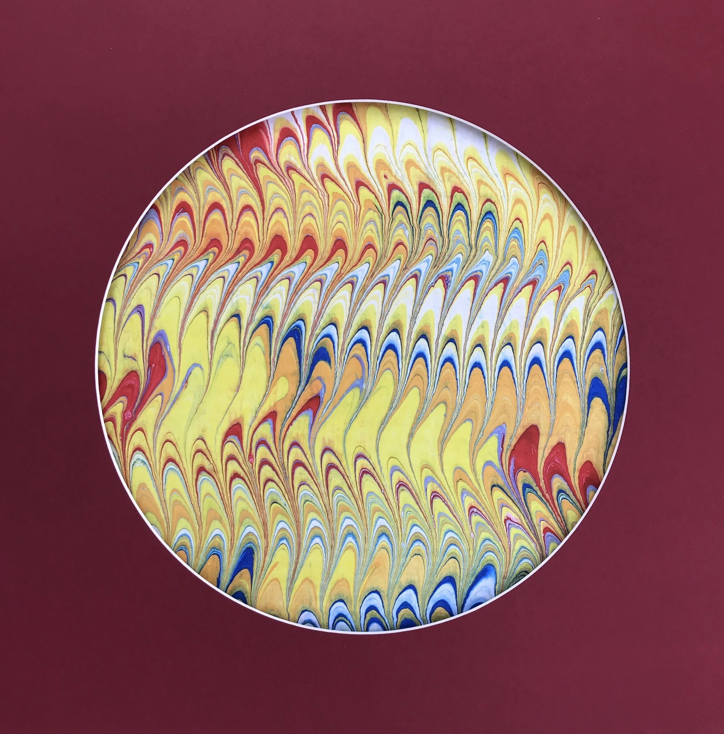 Calligraphic Yellow Marbled Moon print, the combed yellow marbling shown against a deep red ground