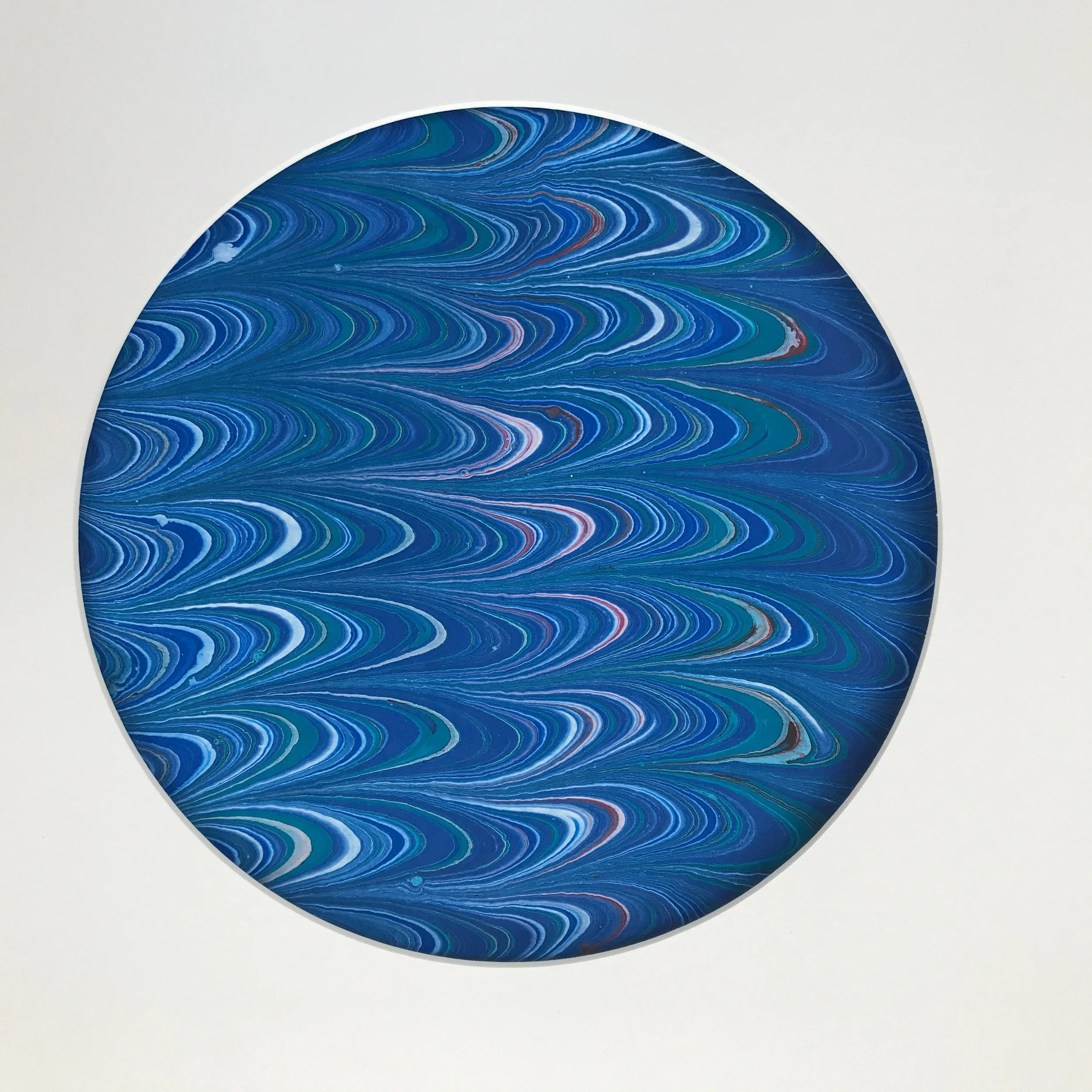 Blue River Marbled Moon print, the combed blue marbling shown against a pale cream ground
