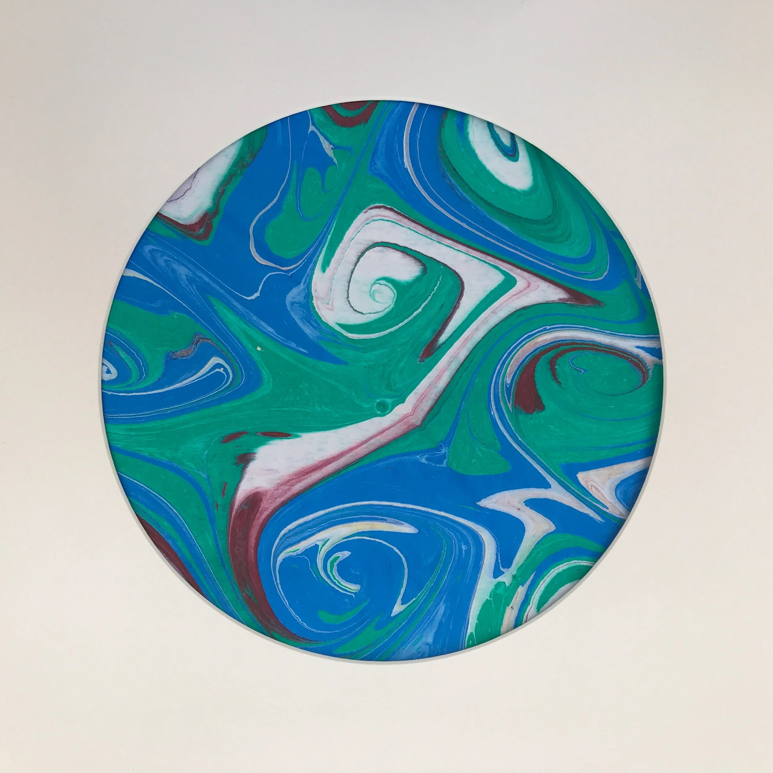 Green Marbled Moon print, the marbled disc shown against a pale cream ground