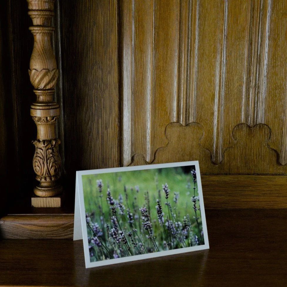 Dargle Lavender Farm greetings card standing on a wooden mantelpiece