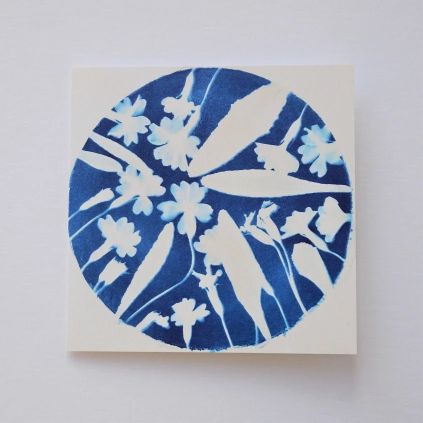 Early to Spring greetings card, a circular blue cyanotype print of spring blossom and leaves