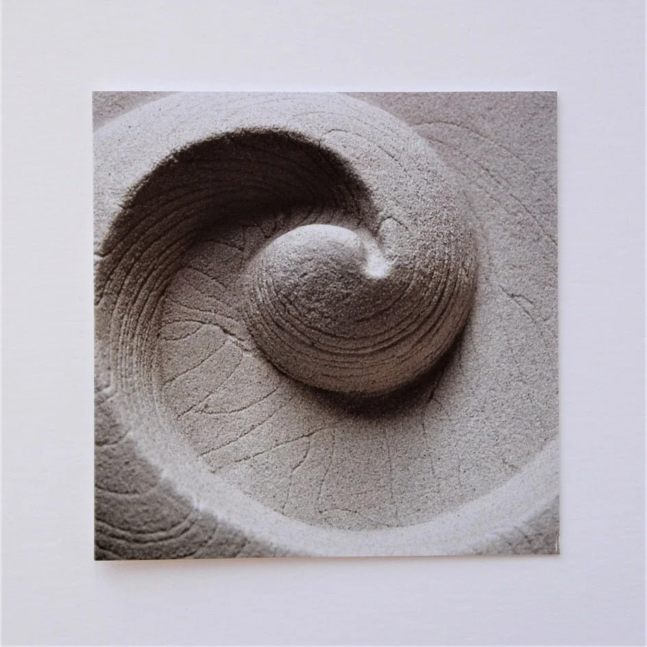 Barbados Shellmoon greetings card, a photograph of a carved sand-toned shell spiral relief