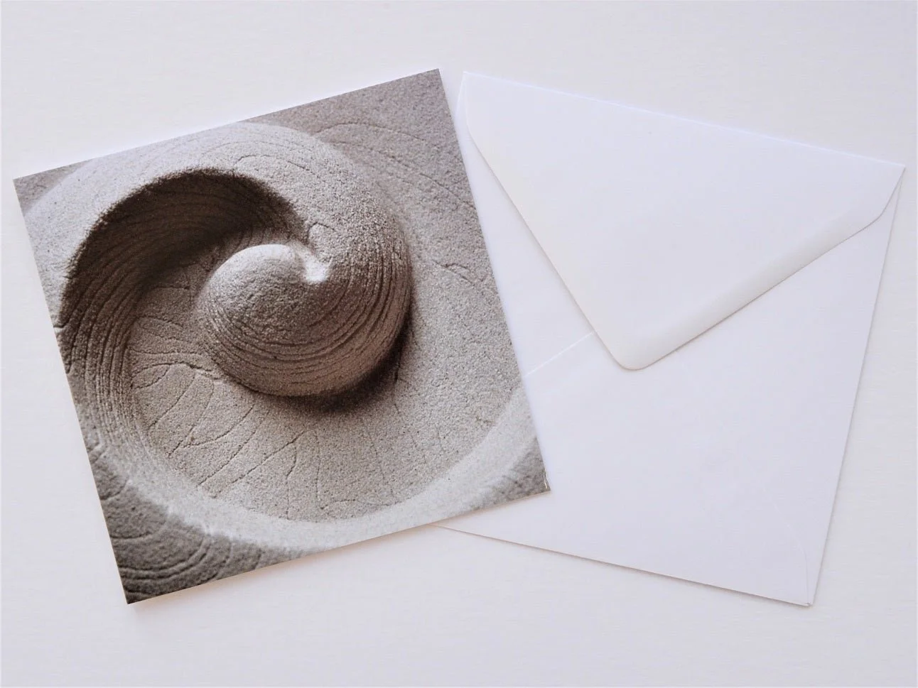 Barbados Shellmoon greetings card shown at an angle with its white envelope
