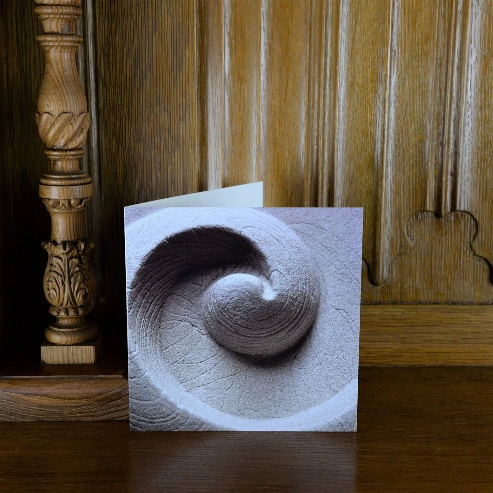 Barbados Shellmoon greetings card standing on a wooden mantelpiece