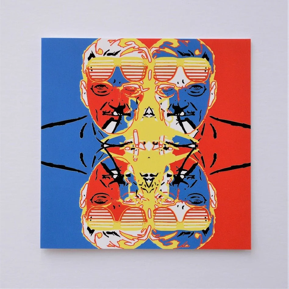Glass Man greetings card, a symmetrical graphic face in yellow, red and blue