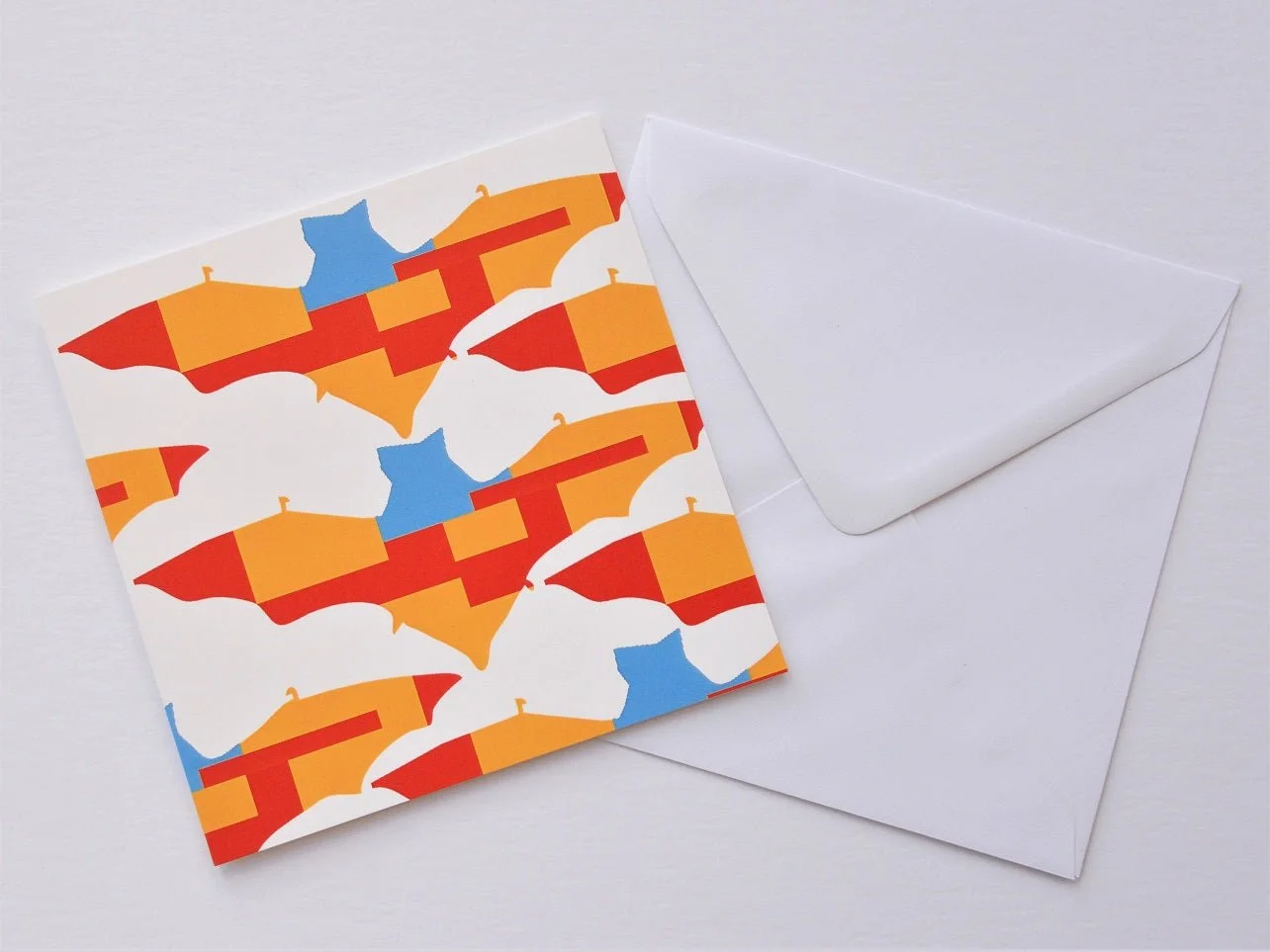 Bat Again greetings card shown at an angle with its white envelope