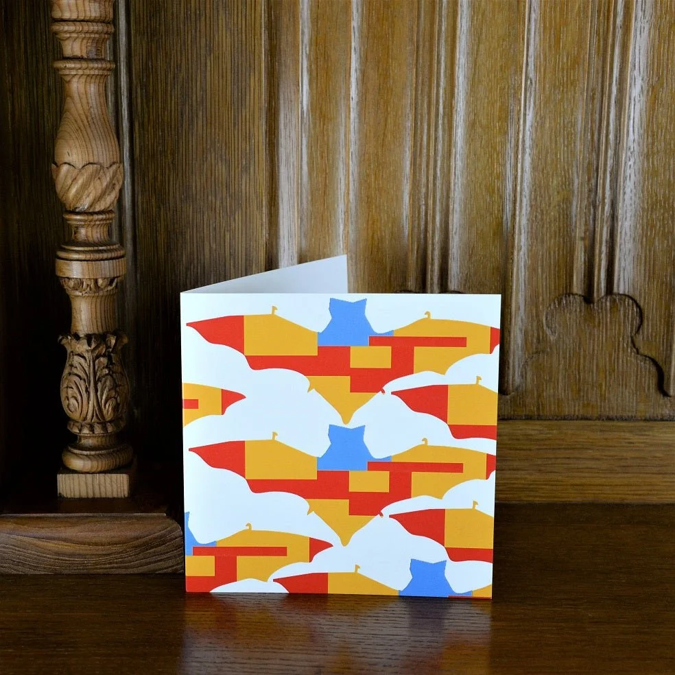 Bat Again greetings card standing on a wooden mantelpiece