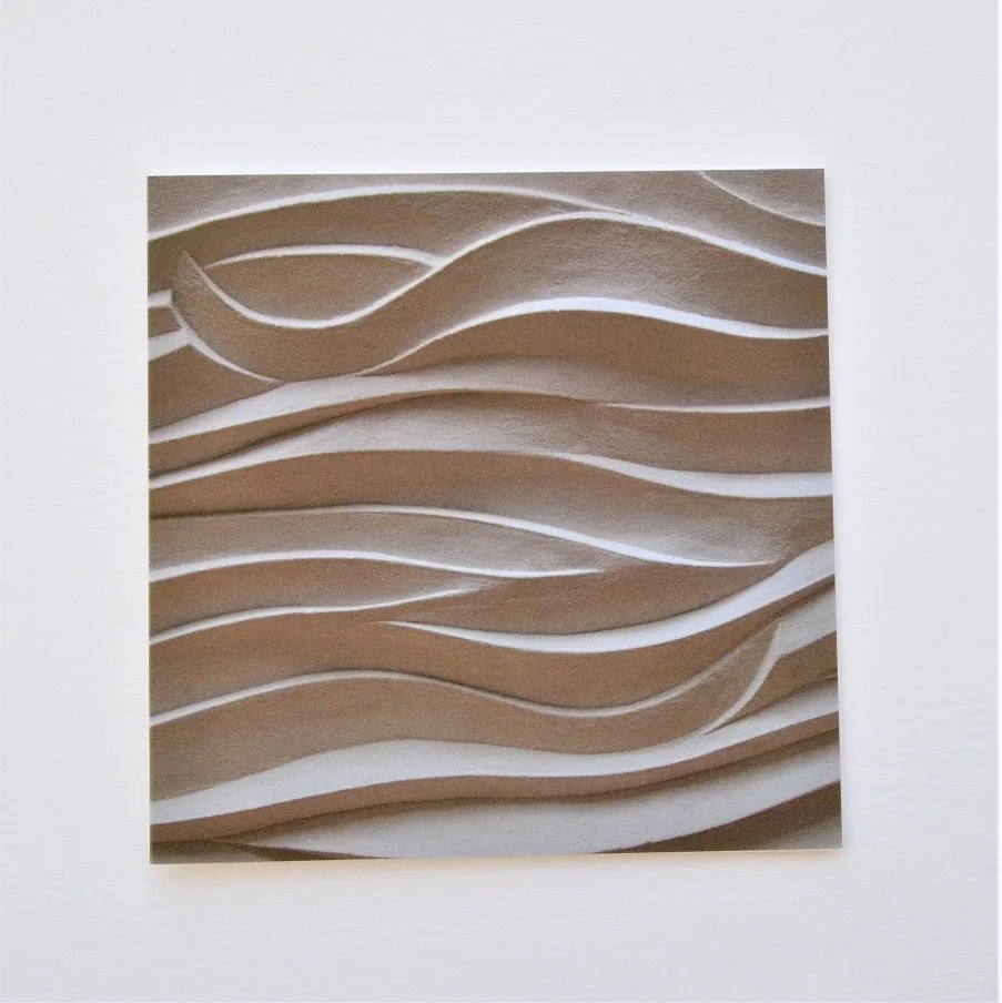 Jersey Seaweed Ripple greetings card, a photograph of a carved relief of rippling seaweed lines in sand tones