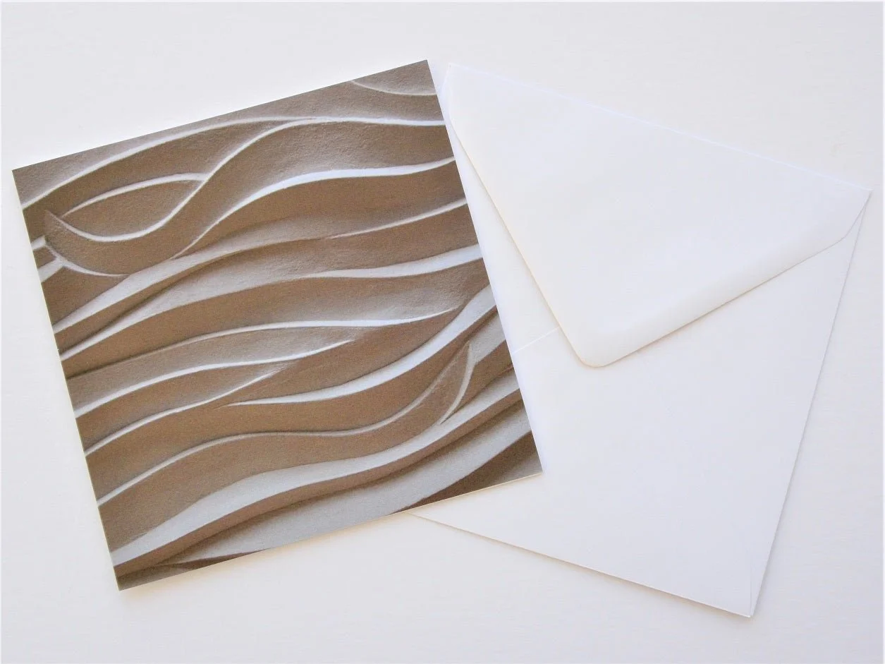 Jersey Seaweed Ripple greetings card shown at an angle with its white envelope
