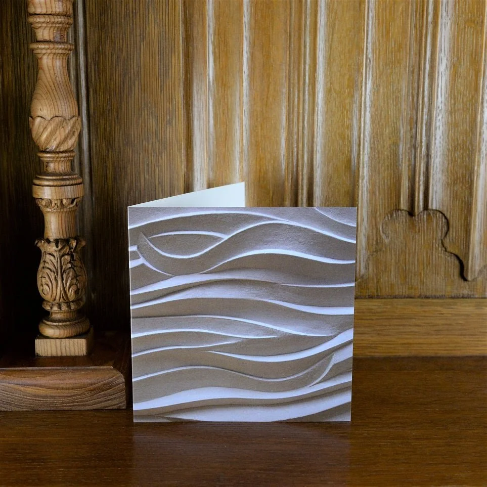 Jersey Seaweed Ripple greetings card standing on a wooden mantelpiece