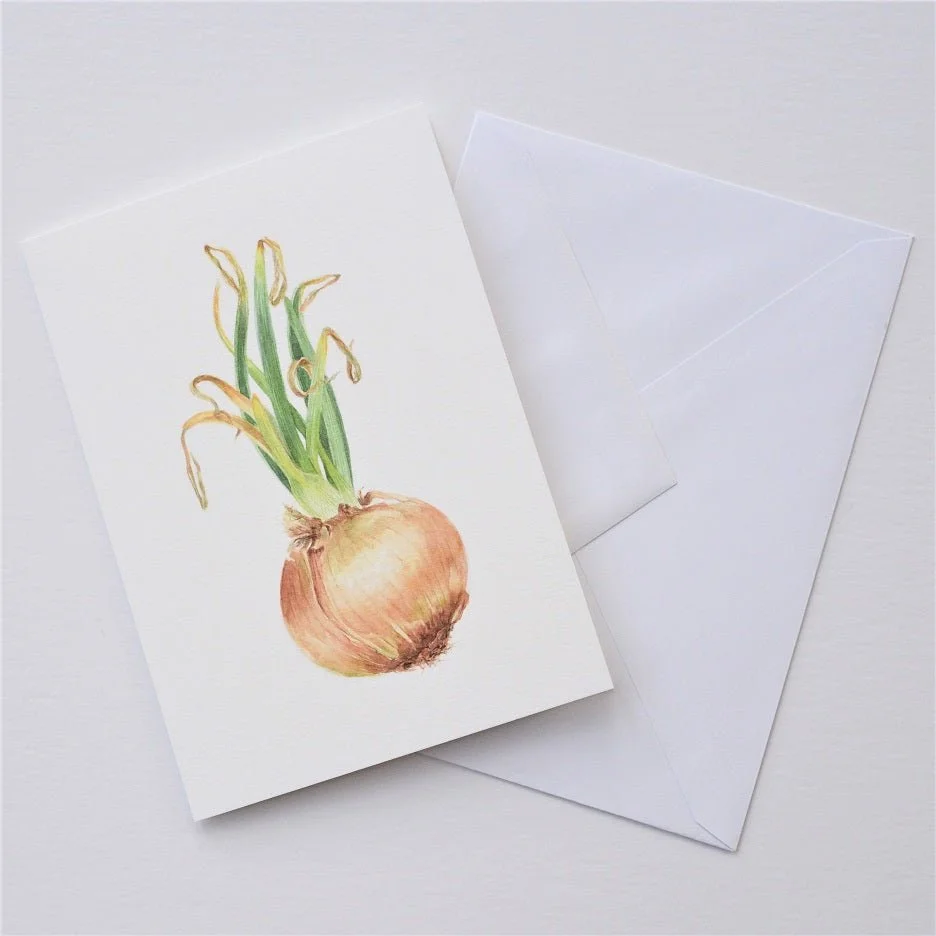 Sprouting Onion Green vertical greetings card shown at an angle with its white envelope