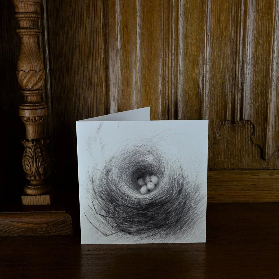 Nested Eggs greetings card standing on a wooden mantelpiece
