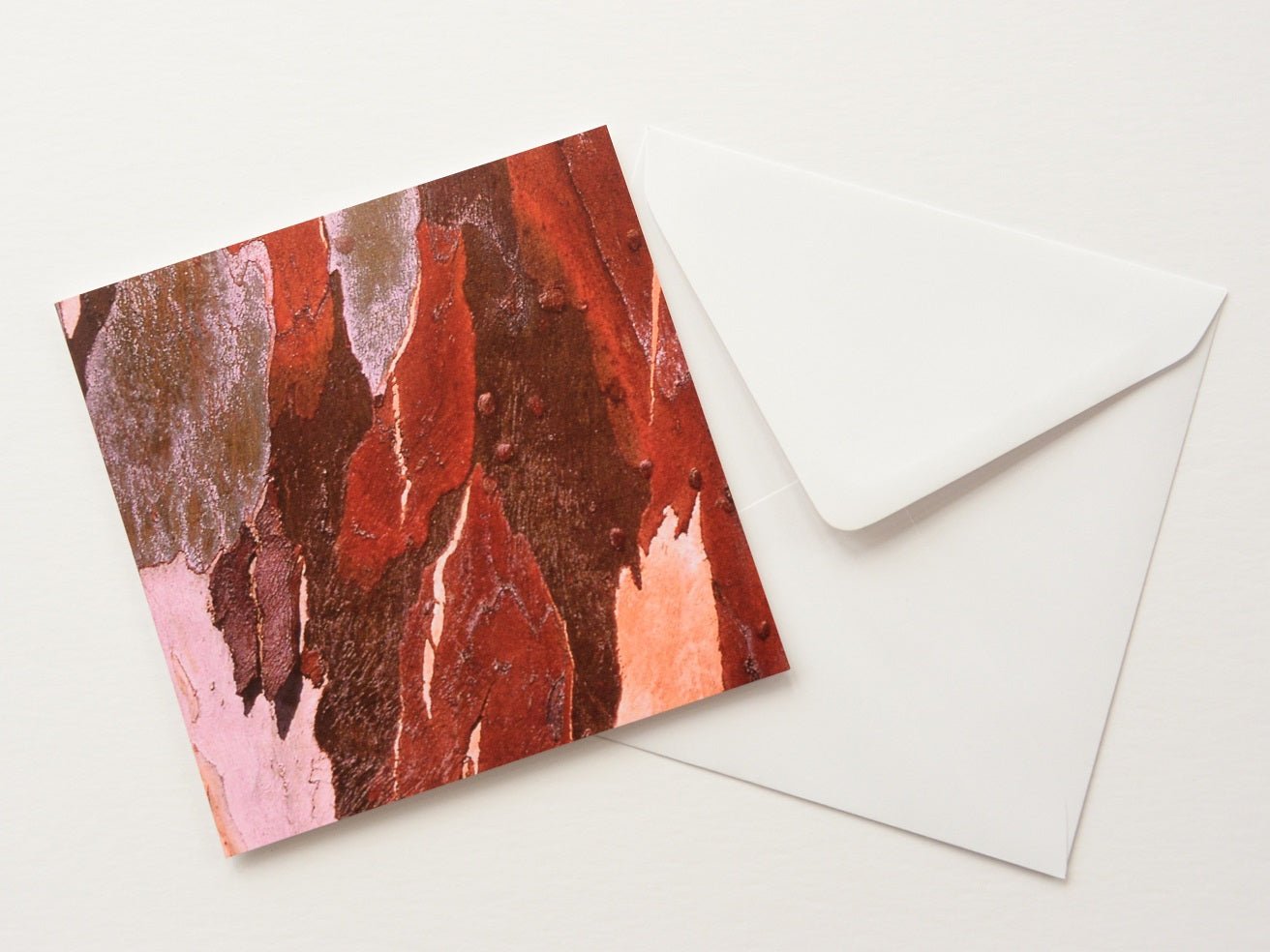 Eucalyptus Landscape greetings card shown at an angle with its white envelope