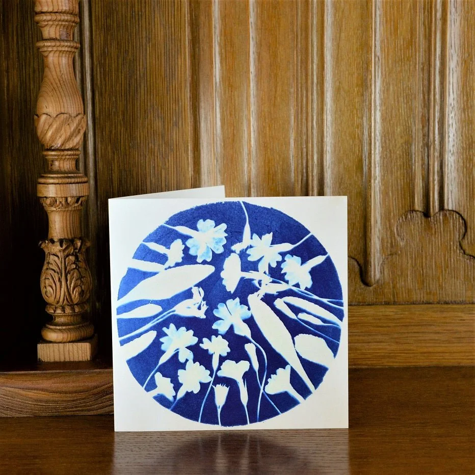 Early One Spring greetings card standing on a wooden mantelpiece