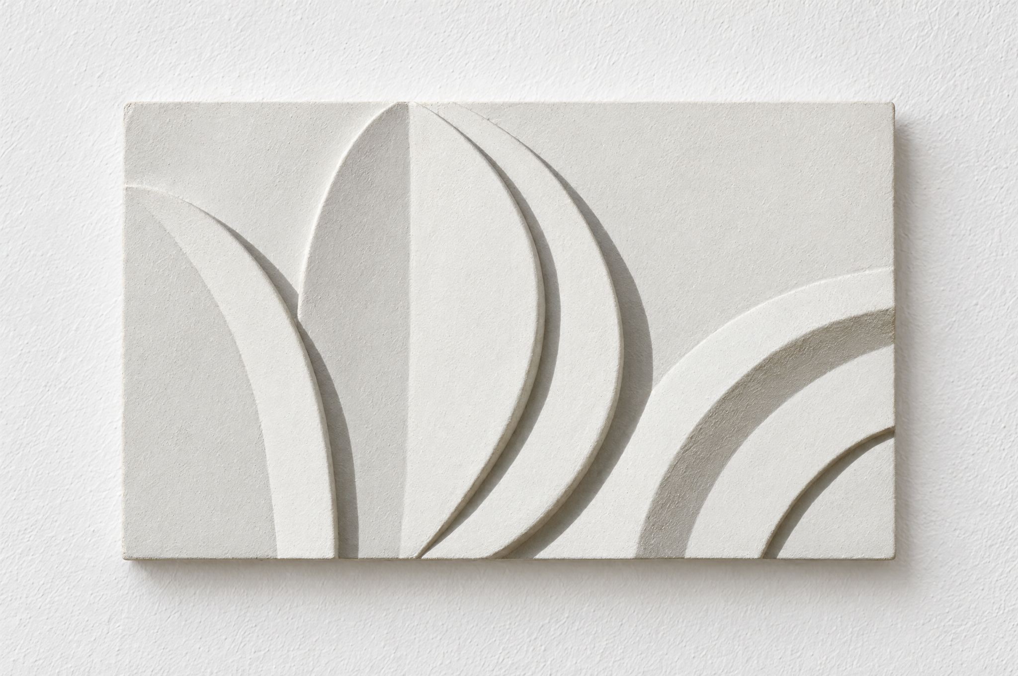 White Acanthus and Moon relief with a central leaf and sweeping arcs against a white background.