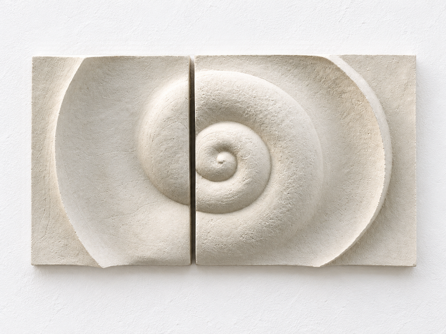 Front view of the paired white Bone Spiral panels against a white background.