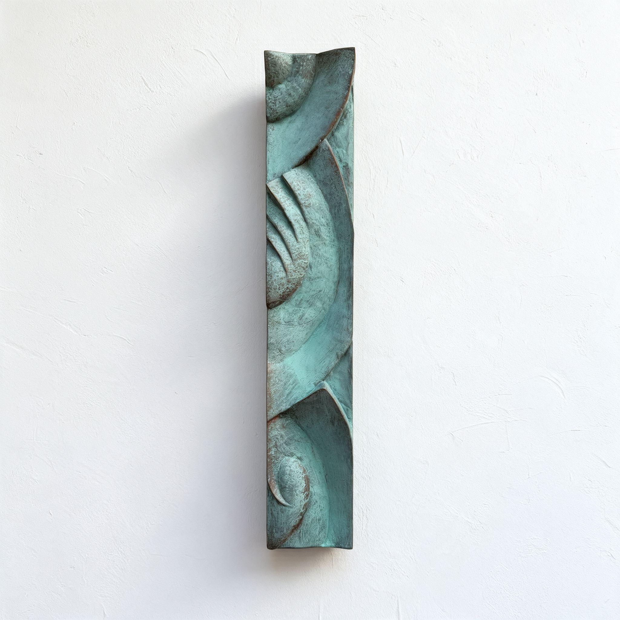 Verdigris Decowaves 2 relief with fan-like ridges and curved bands against a pale background.