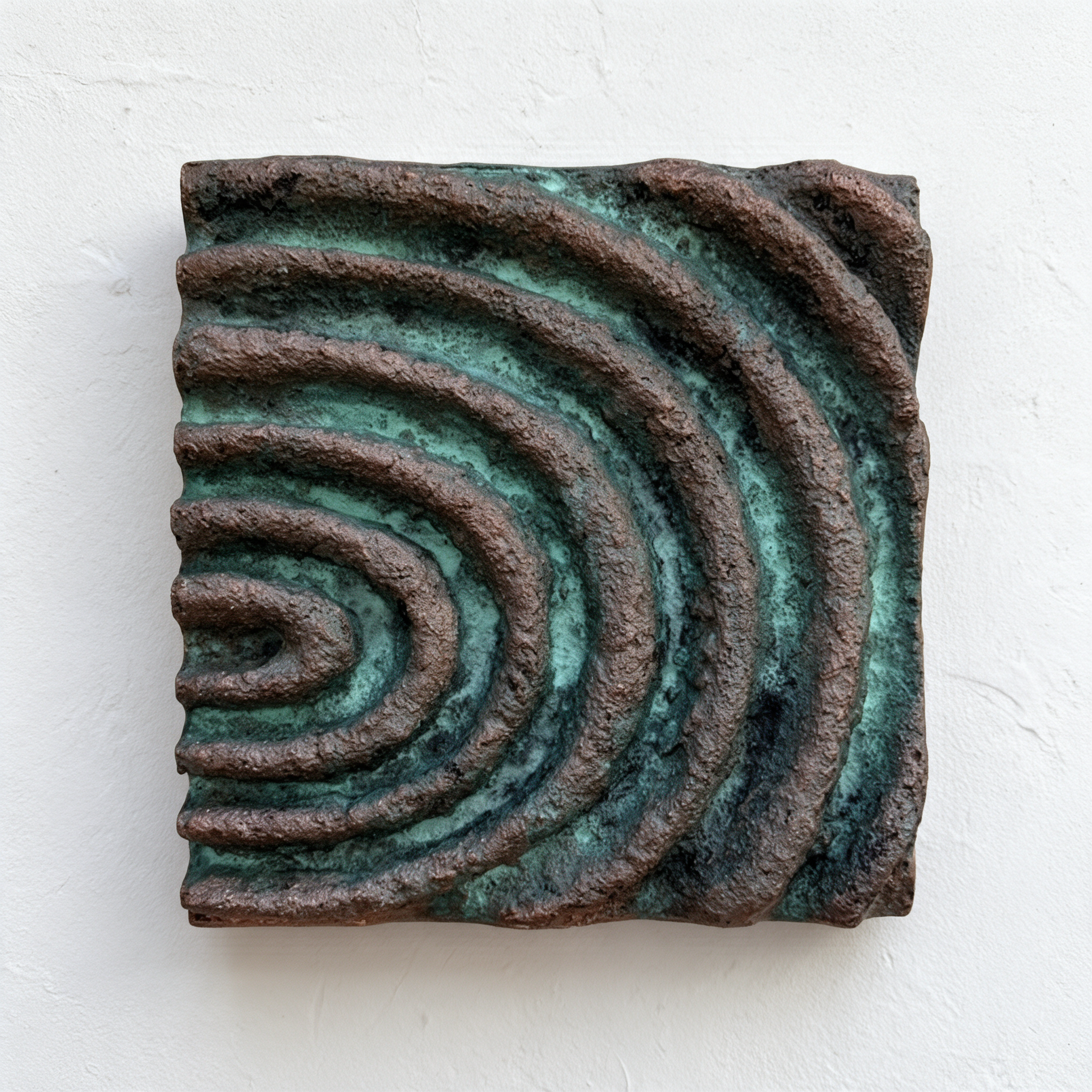 Verdigris Echo Sound 2 with rough concentric rings curving towards the left edge.