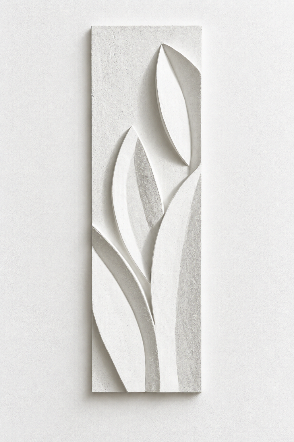 White Leaf Growth relief with three pointed leaf forms against white.