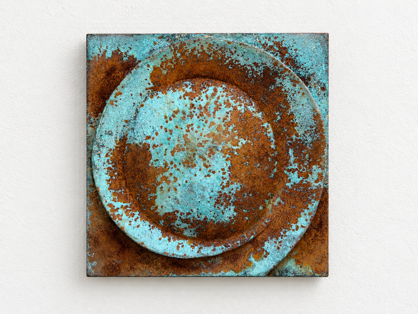 Front view of verdigris and rust Moon Crater Phase 2 against white.