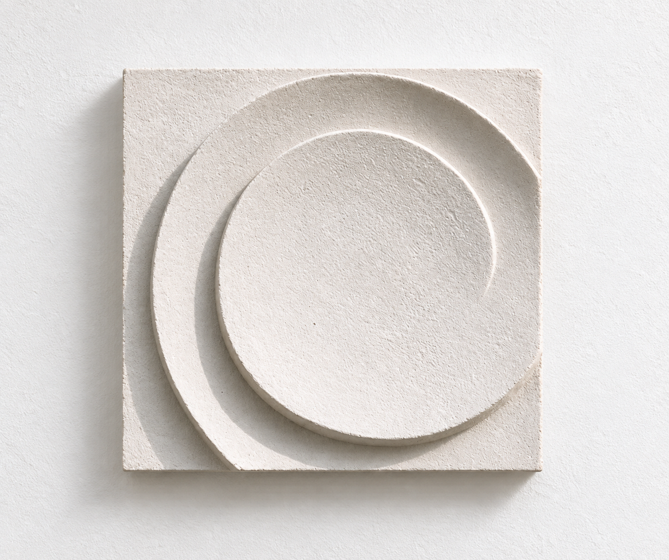 White Moon Ring square relief with overlapping raised circular bands.