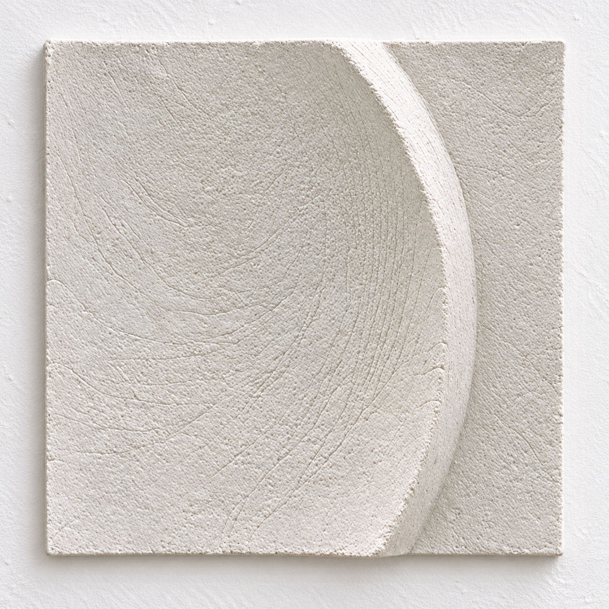 Front view of the white Moonphase 4 curved bowl relief against a pale background.