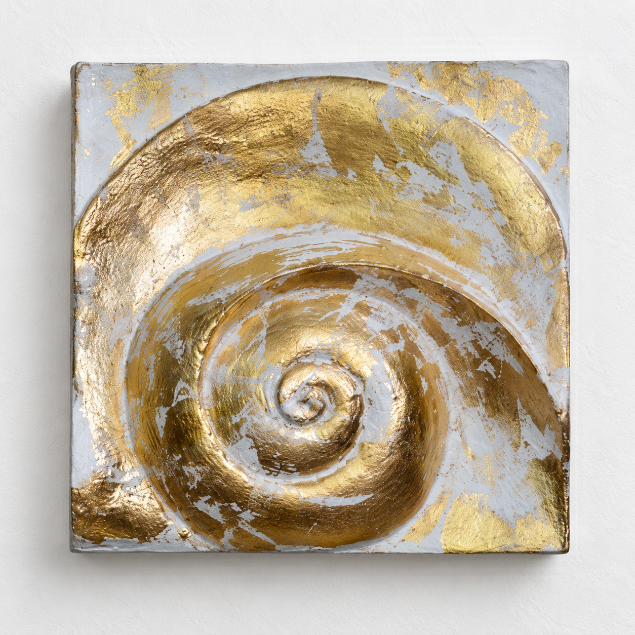 Moonphase 2 panel with a gold-coloured spiral and broad curved band on a white square background.